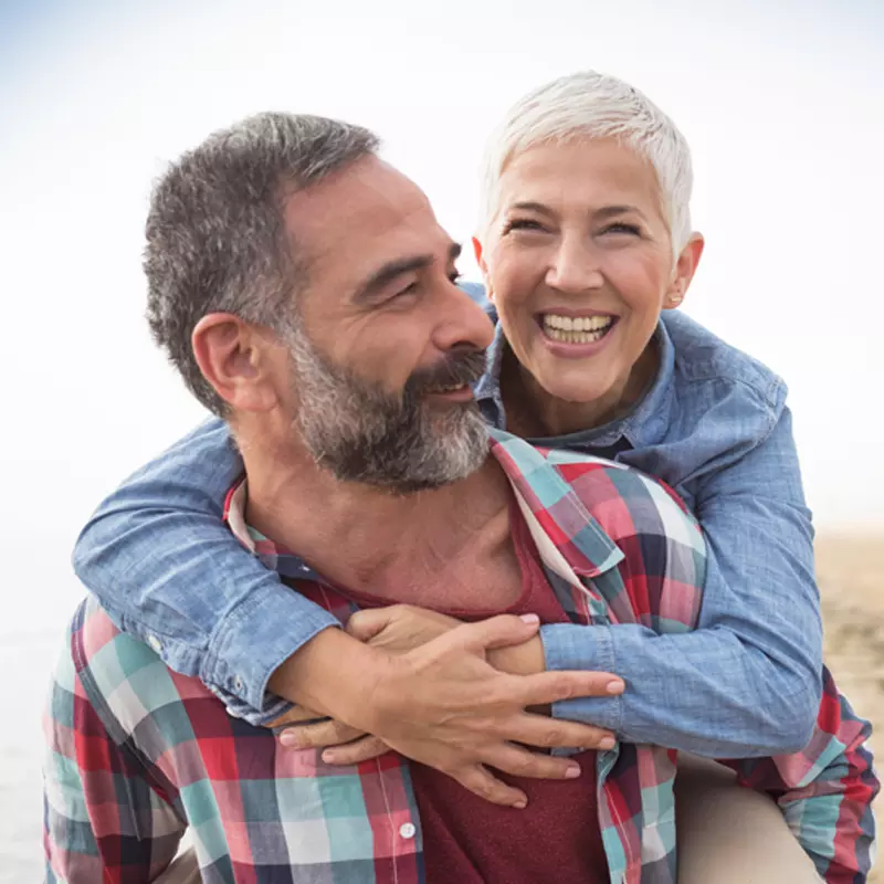 couple embracing and laughing