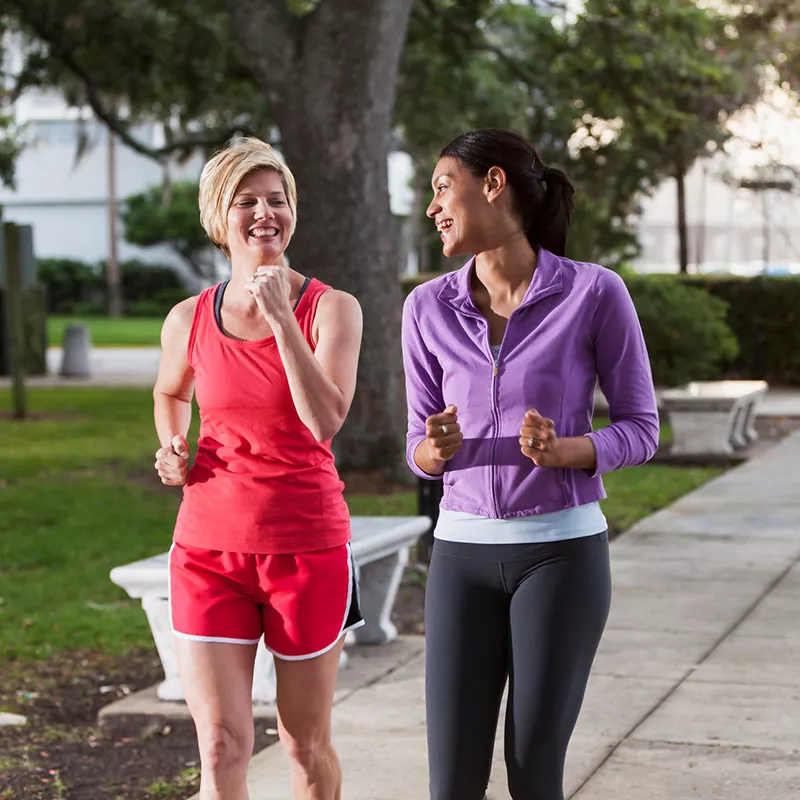 women-walking and conversing