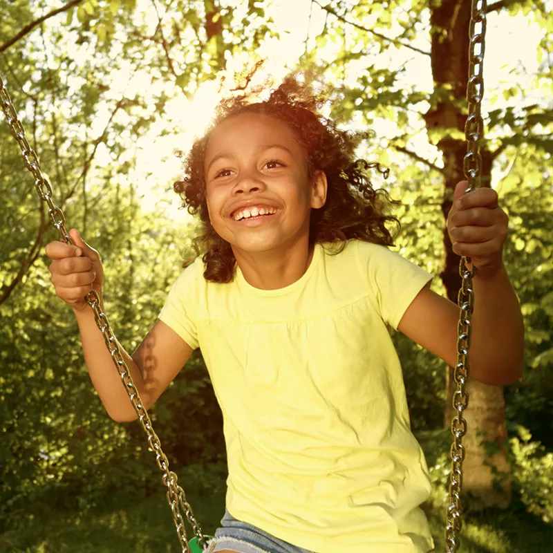 girl-having-fun-in-a-swing