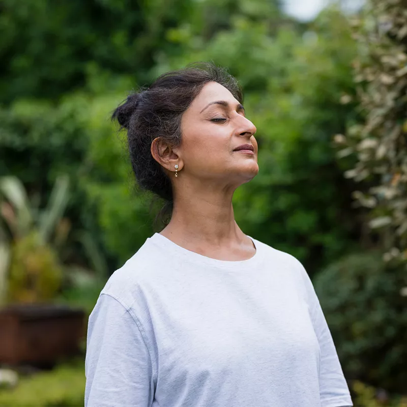 a-woman-breathing-outdoors