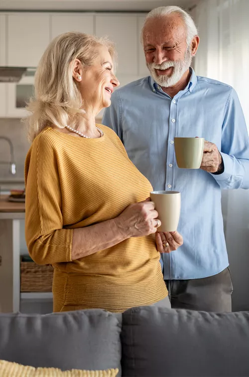 60s couple in their living room