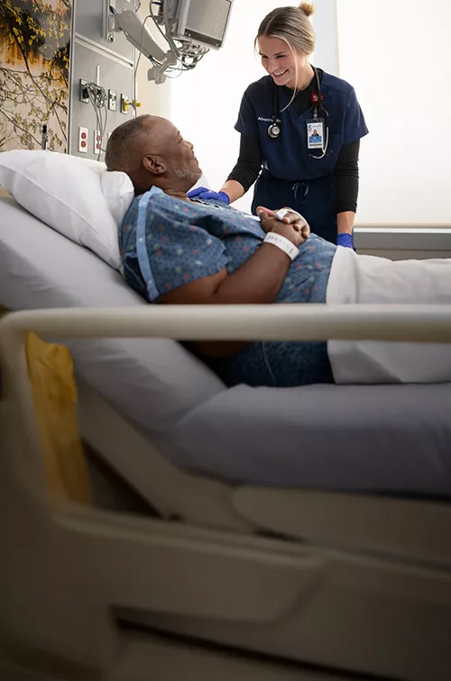 patient and provider in hospital room