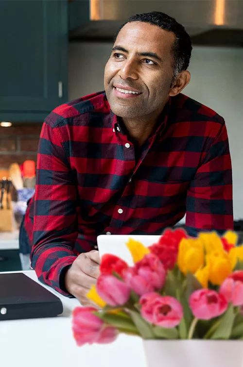 man-at-the-table-smiling