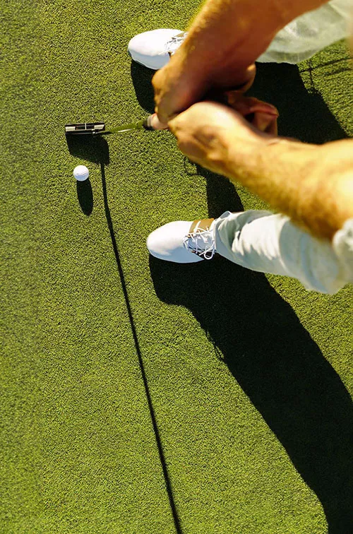 man-playing-golf- ready to put