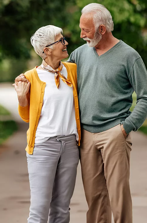 woman and man talking in park